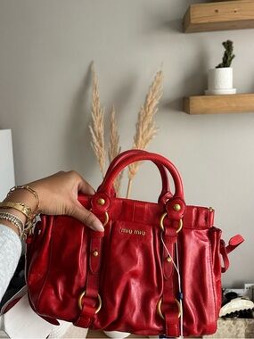 Vintage miu miu Vitello leather bag in red. Brand New